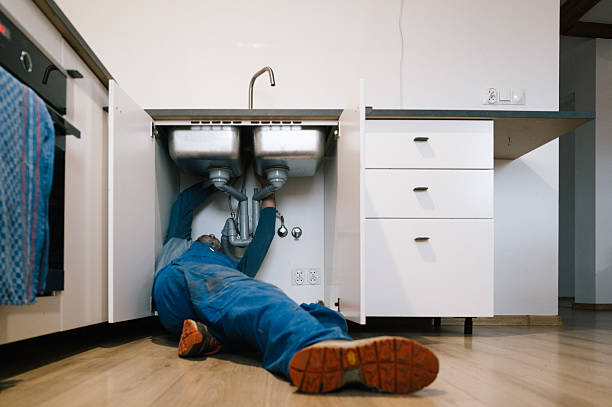 Professional Emergency Plumber technician working in Titusville, NJ